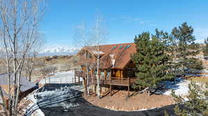 Exterior space with a deck with mountain view