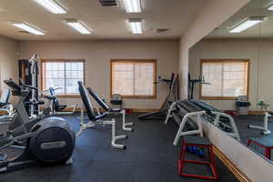 Gym with a textured ceiling