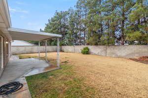 View of yard with a patio