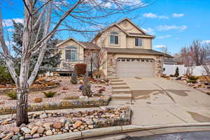 Front of property with a garage