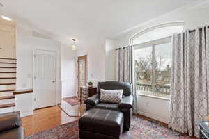 Sitting room featuring wood-type flooring