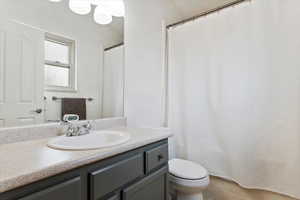 Bathroom featuring toilet and vanity