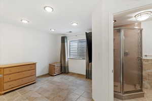 Bathroom featuring walk in shower