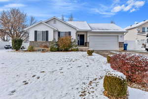 Ranch-style home with a garage