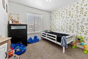 Bedroom with carpet flooring