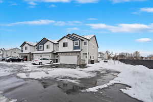 View of front of property with a garage