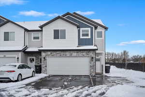 View of front of home with a garage