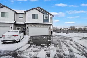 View of front of home featuring a garage