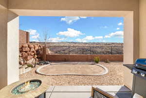 View of patio / terrace featuring grilling area and a fire pit