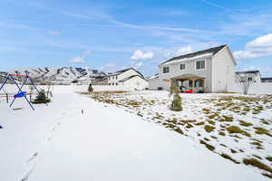 Snow covered house with a gazebo