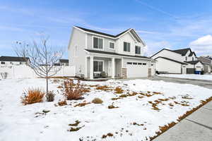 View of front property with a garage