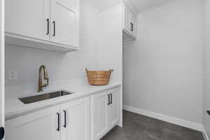 Laundry room next to primary suite for your convenience