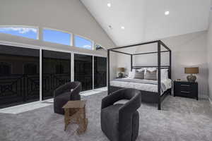 Bedroom featuring high vaulted ceiling and light carpet