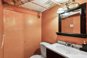 Bathroom with vanity and toilet