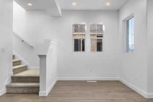 Interior space with hardwood / wood-style floors