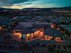 Aerial view at dusk featuring a mountain view