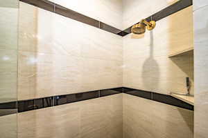 Bathroom with tiled shower