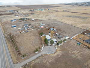 Birds eye view of property featuring a rural view