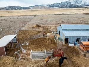 Drone / aerial view with a rural view and a mountain view