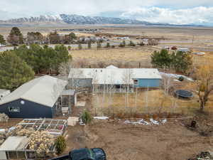 Birds eye view of property with a mountain view