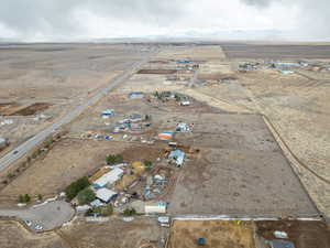 Birds eye view of property featuring a rural view