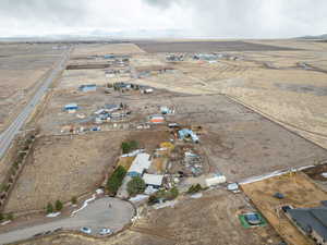 Birds eye view of property featuring a rural view