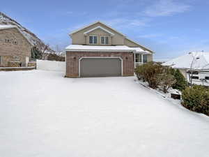 View of front of property with a garage