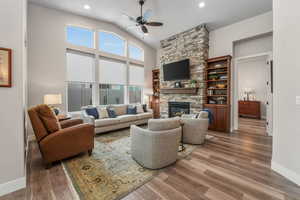 Great Room with Vaulted Ceilings, Custom Stone Gas Fireplace and Built-ins