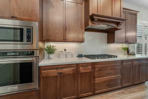 Wall Oven, Gas Cooktop, Under-Cabinet Lighting