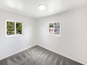 View of carpeted spare room