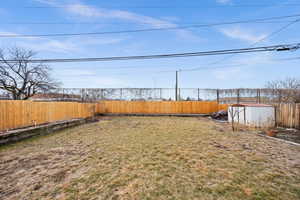 View of yard with a shed