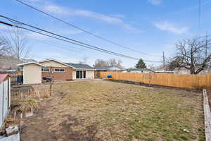 View of yard with a storage shed