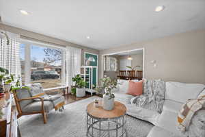 Living room with hardwood / wood-style floors