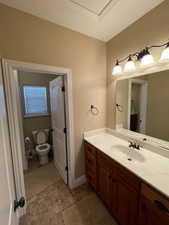 Bathroom featuring toilet and vanity