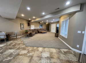 Living room with carpet floors