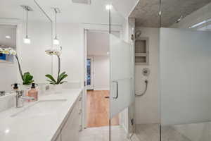 Jack and Jill bathroom with heated floors and euro shower door