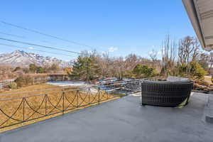 View of patio / terrace with a mountain view