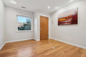 Foyer with hardwood / wood-style floors