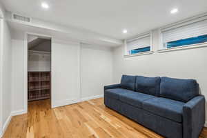 Living room with hardwood / wood-style floors