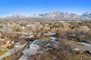 Birds eye view of property featuring a mountain view