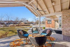 View of patio featuring ceiling fan