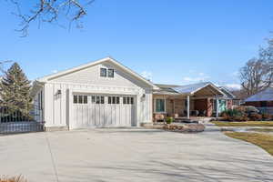 Ranch-style home featuring a garage