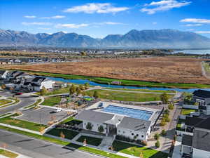 Bird's eye view of pool, park, natural warm springs, and mountain view