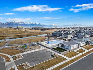 Bird's eye view of pool, park, natural warm springs, and mountain view