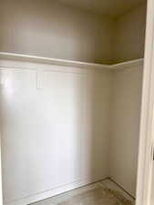 Bedroom with walk in closet