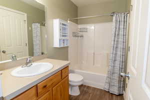 Bathroom featuring wood-style floor