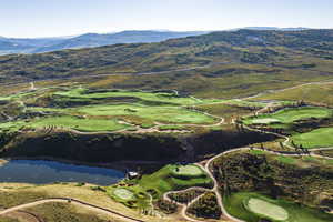 Bird's eye view with a water and mountain view