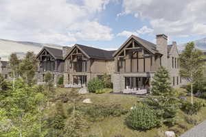 Back of property featuring an outdoor living space