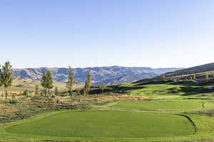 Surrounding community featuring a mountain view