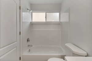 Bathroom with  shower combination and toilet